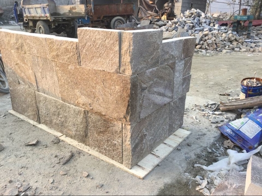 China Yellow Granite Retaining Wall Natural Stone Cladding Granite Backsplash Wall Corner Stone supplier